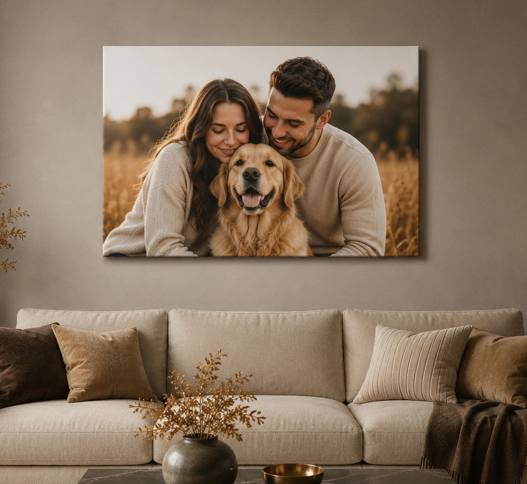 Horizontal couple and pet canvas displayed above a sofa