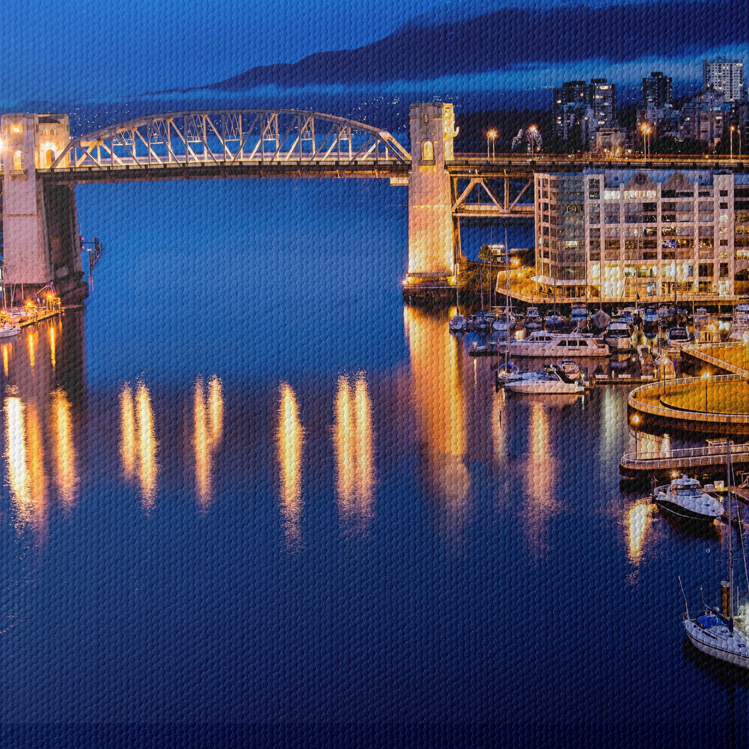 Stunning Cityscape at Night with Reflections - Image 4