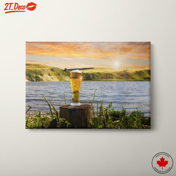 Refreshing Beer by the Water at Sunset