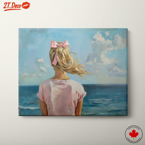 Girl Watching the Ocean with a Pink Bow