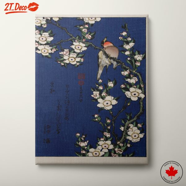 Bird Sitting on Blossoming Branch