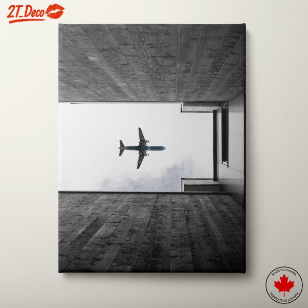 Airplane Above Modern Architecture