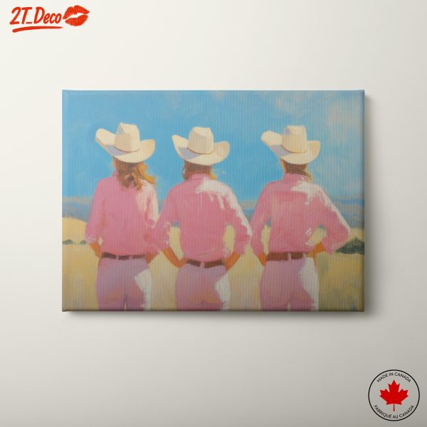 Three Cowgirls in Pink Clothing Against a Blue Sky