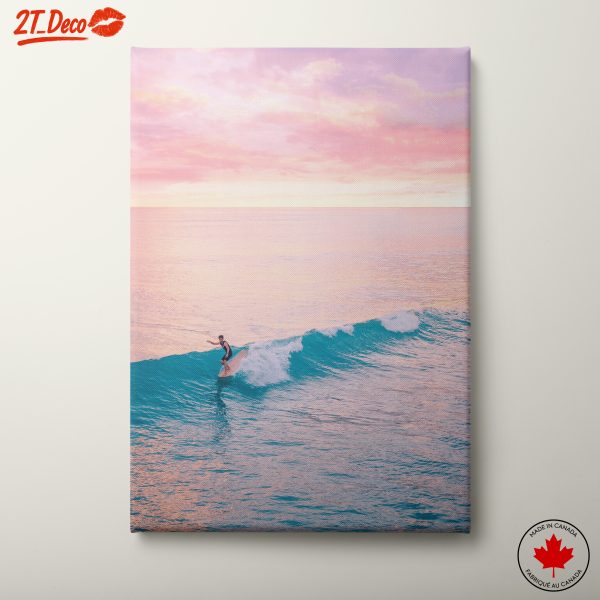 Surfer Riding Waves at Sunset