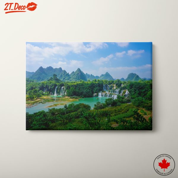 Breathtaking Waterfall Surrounded by Lush Mountains