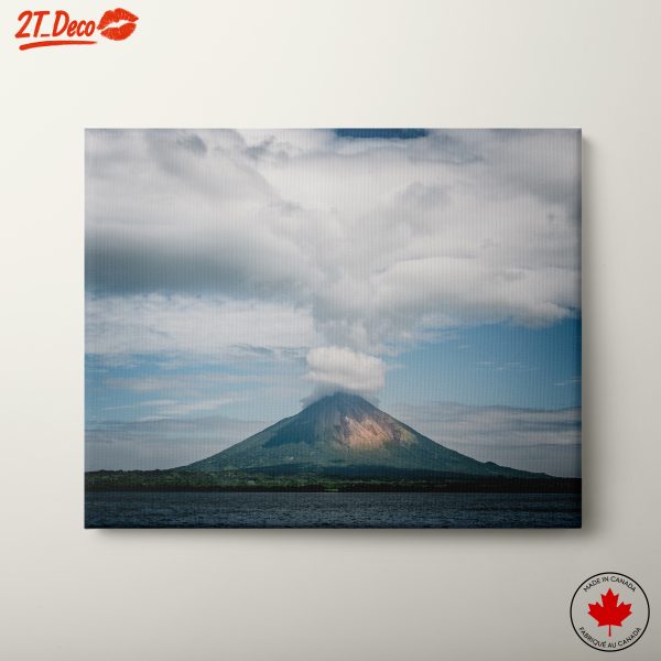 Erupting Volcano Against a Blue Sky