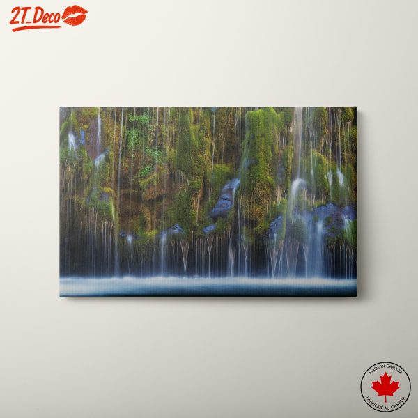 Stunning Waterfall Surrounded by Lush Greenery