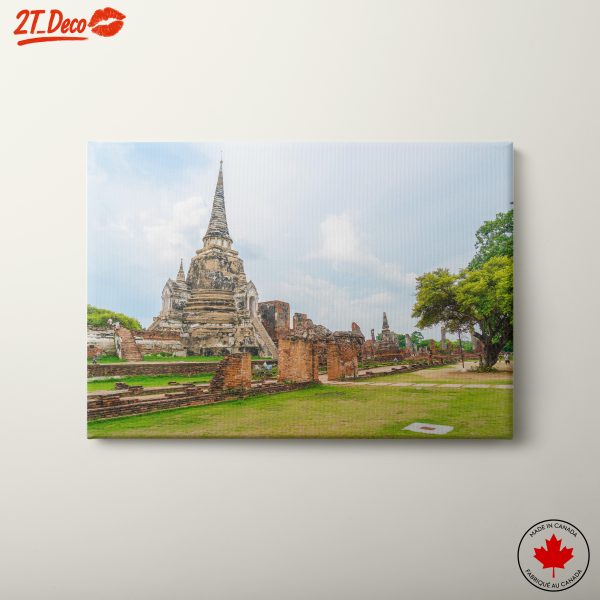 Ancient Thai Temple Ruins Under Clear Skies