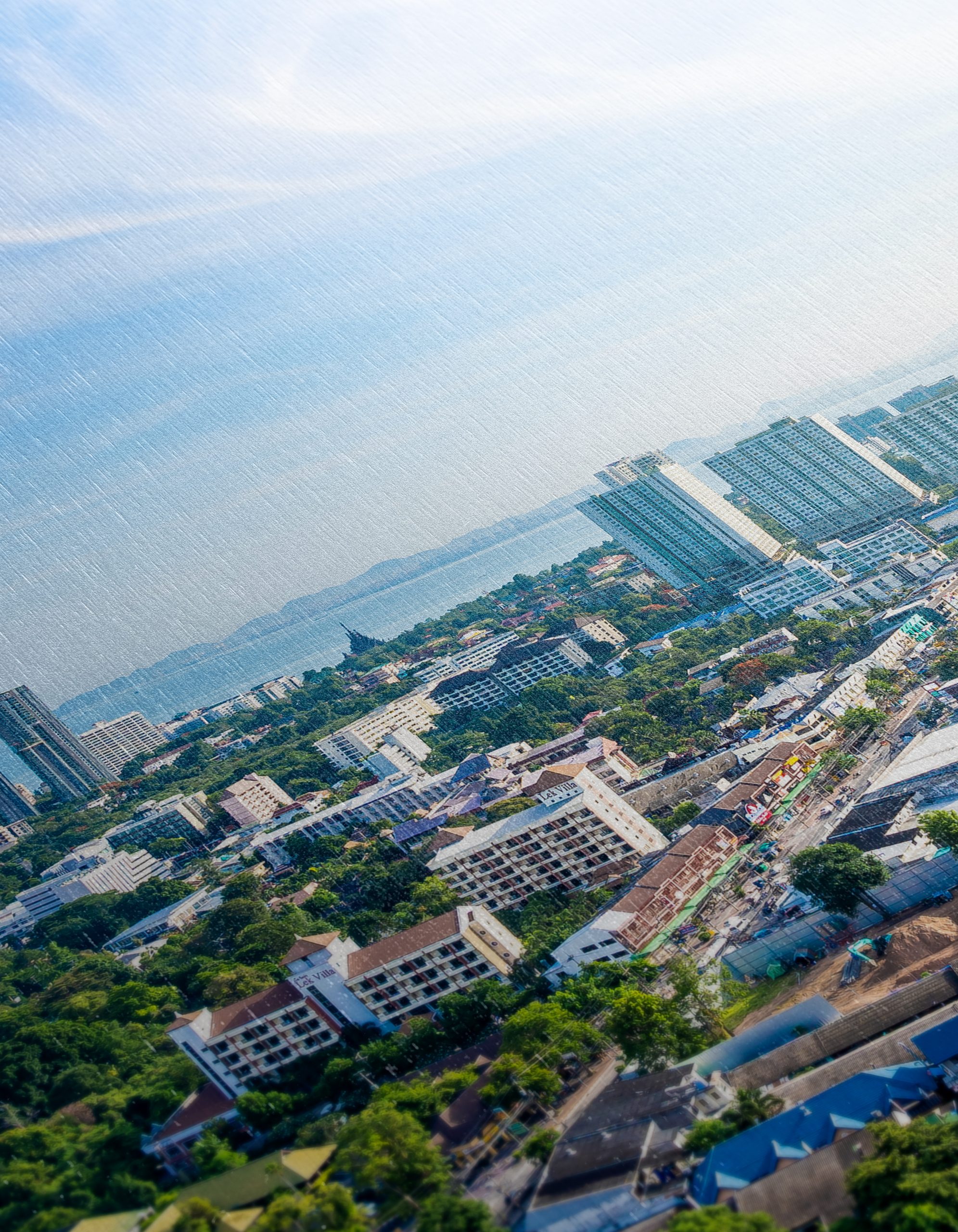 Vibrant Cityscape Overlooking the Ocean - Image 12