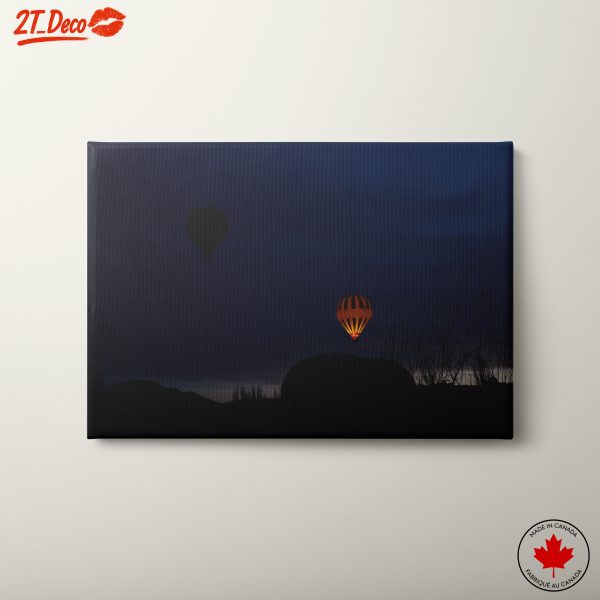 Illuminated Hot Air Balloons Against Twilight Sky