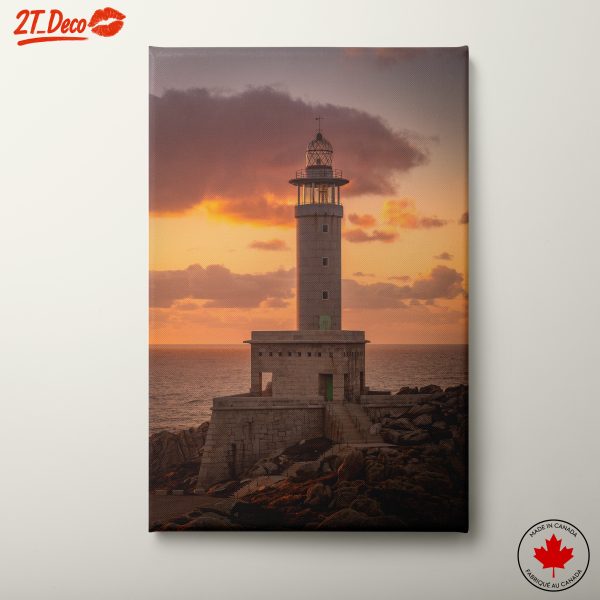 Lighthouse at Sunset Over the Sea