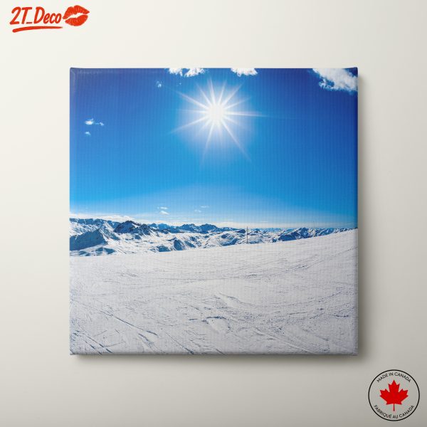Snowy Mountain Landscape Under Bright Sun