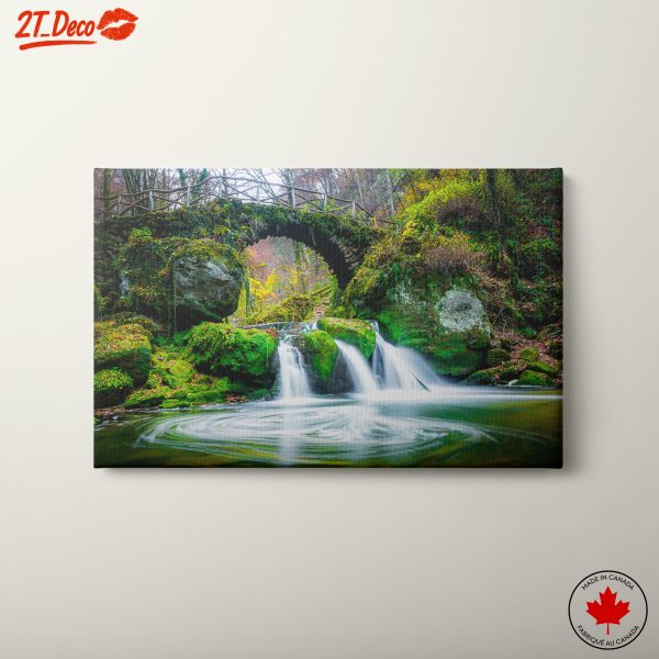 Serene Waterfall Surrounded by Lush Greenery