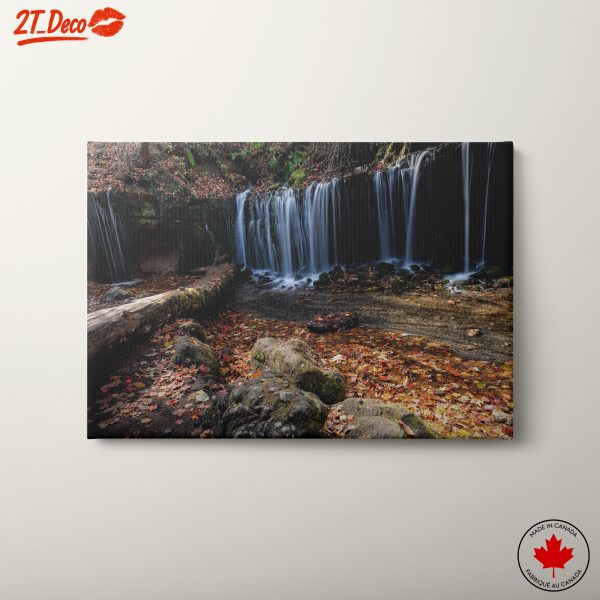 Tranquil Waterfall Amidst Autumn Foliage