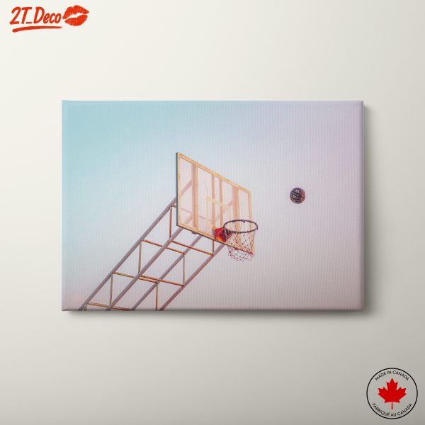 Dynamic Basketball Shot Under A Colorful Sky
