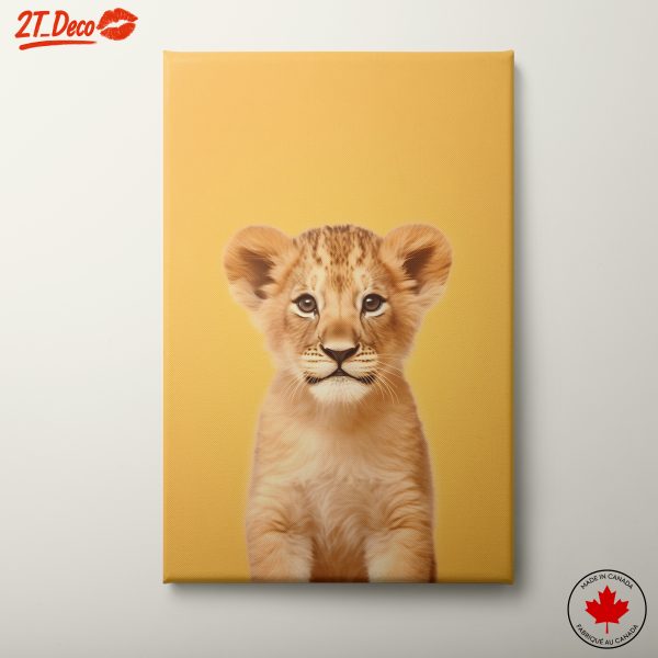 Adorable Young Lion Portrait Against Yellow Background